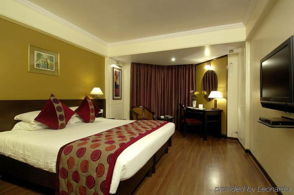 Ramee Guestline Hotel Juhu Мумбаи Номер фото